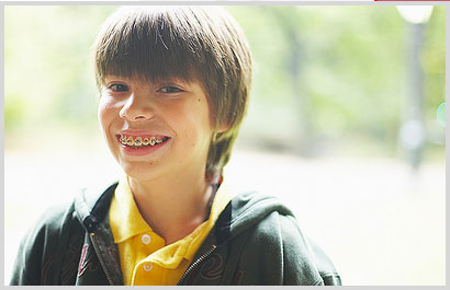 smiling boy with braces